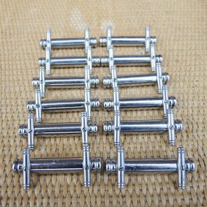 12 Anciens Porte-Couteaux Art Déco en Métal